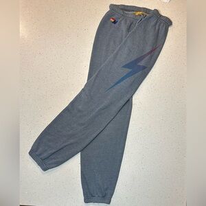 Aviator Nation pre-loved unisex sweats with blue/purple bolt on one side